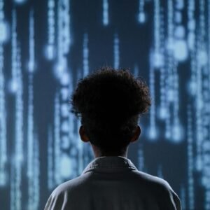 A young boy viewing a digital screen with data streams, symbolizing technology interaction.